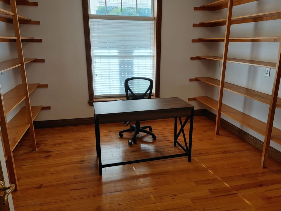 Private office just off kitchen, ergonomic chair, close door for max privacy