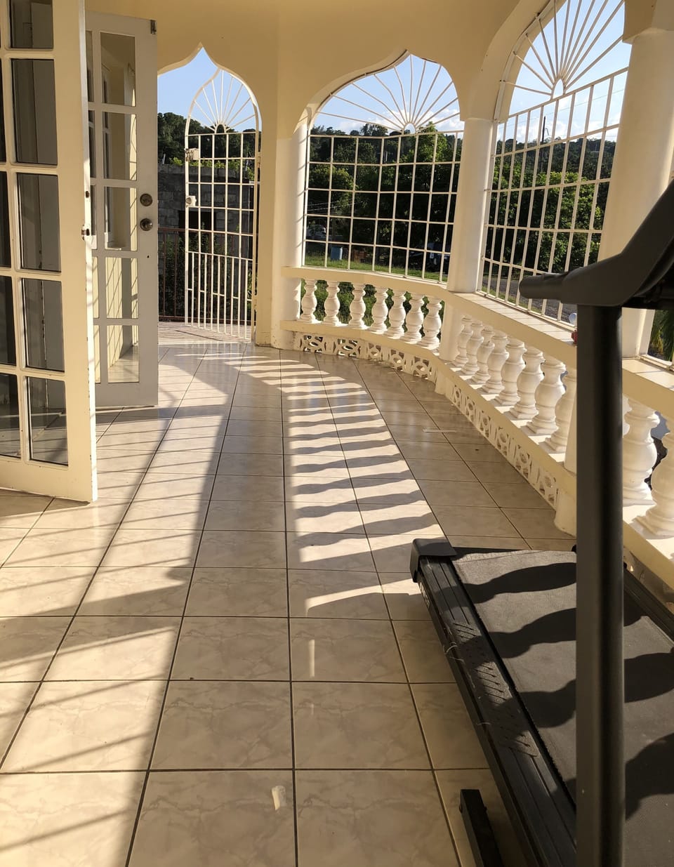 Access from master bedroom to balcony.  Enjoy early morning treadmill exercise! 