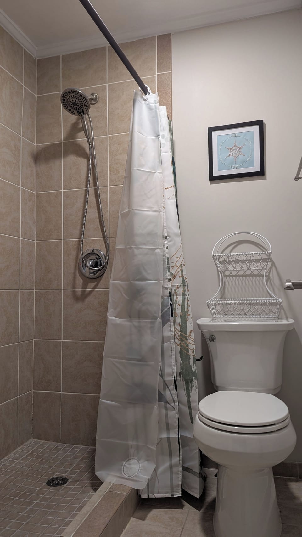 Bdrm #1's bathroom includes large walk-in tile shower w/detachable shower head.
