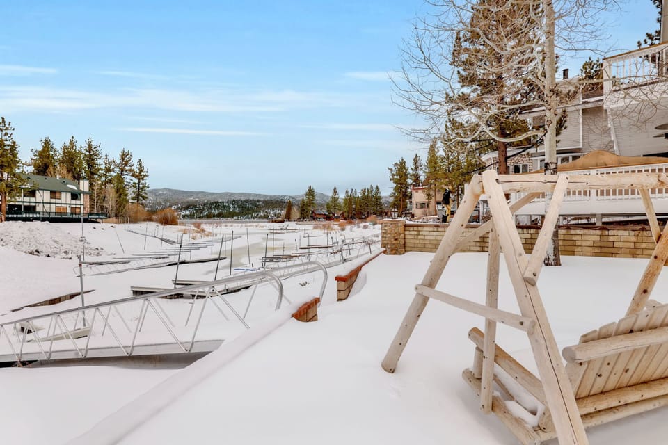 Private outdoor hot tub, surrounded by tall pines, perfect for relaxing under the trees after a day of adventure—enjoy peaceful forest views, fresh air, and a truly rejuvenating stay.
