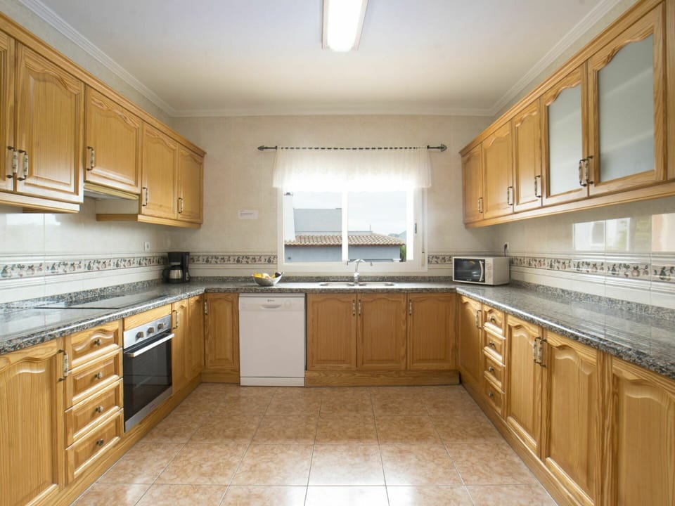 Countertop, Cabinetry, Sink, Kitchen Sink, Furniture, Tap, Kitchen Stove, Drawer, Kitchen, Wood