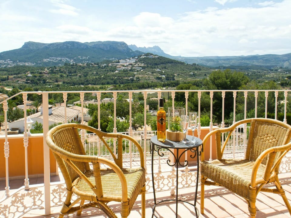 Sky, Furniture, Cloud, Chair, Plant, Table, Wood, Mountain, Fence, Outdoor Furniture