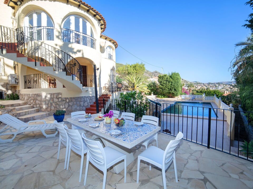 Furniture, Table, Sky, Property, Plant, Building, Chair, Azure, Outdoor Furniture, Outdoor Table