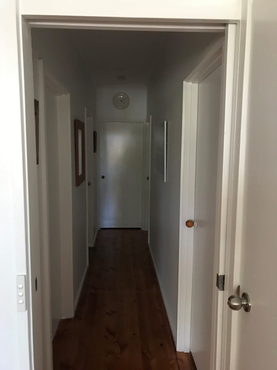 Hall off the lounge to access bedrooms and bathrooms.