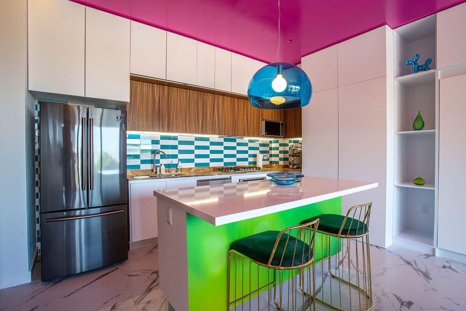 Kitchen bar has 2 high chairs