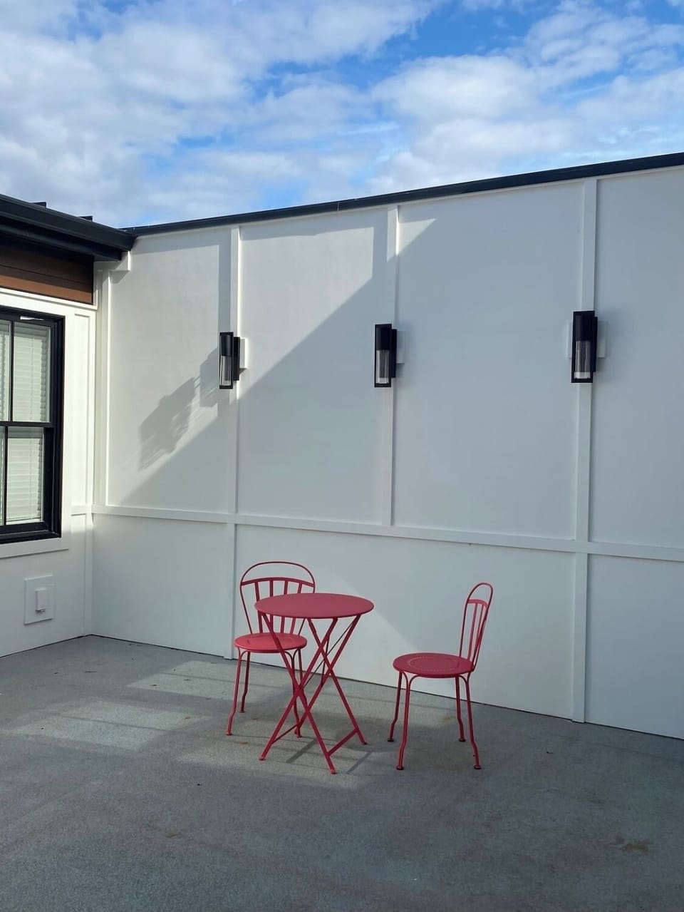 Shared rooftop terrace with cafe table