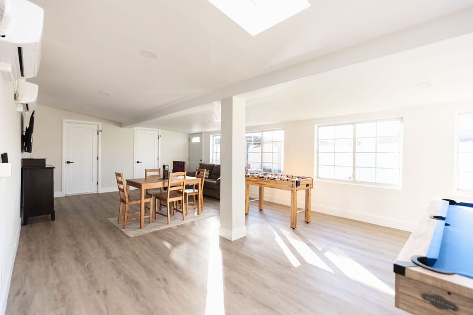 Large game room with pool, ping pong, foosball, board games, card games, SmartTV