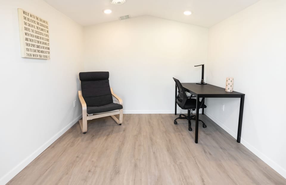 This is the detached office. We have yoga mats in here as well.