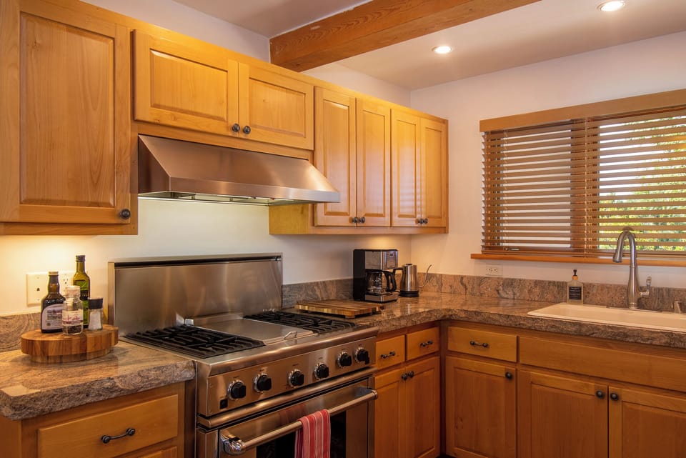 Updated appliances in the fully stocked kitchen. 