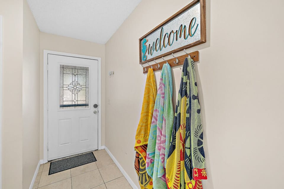 Entry way with hooks for your beach towels