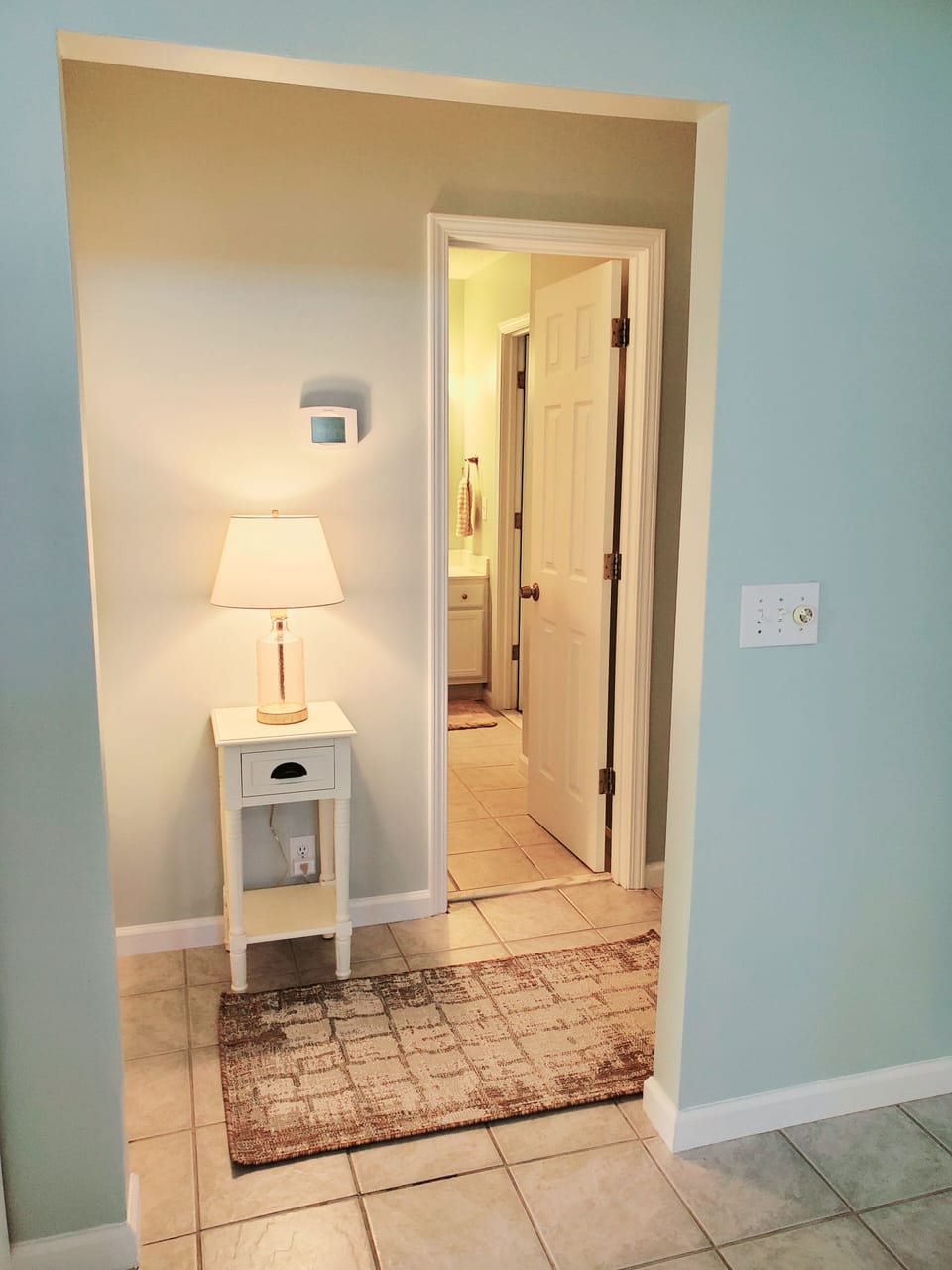 To the master bedroom and bathroom