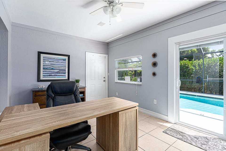 Dedicated work space, with view of pool.