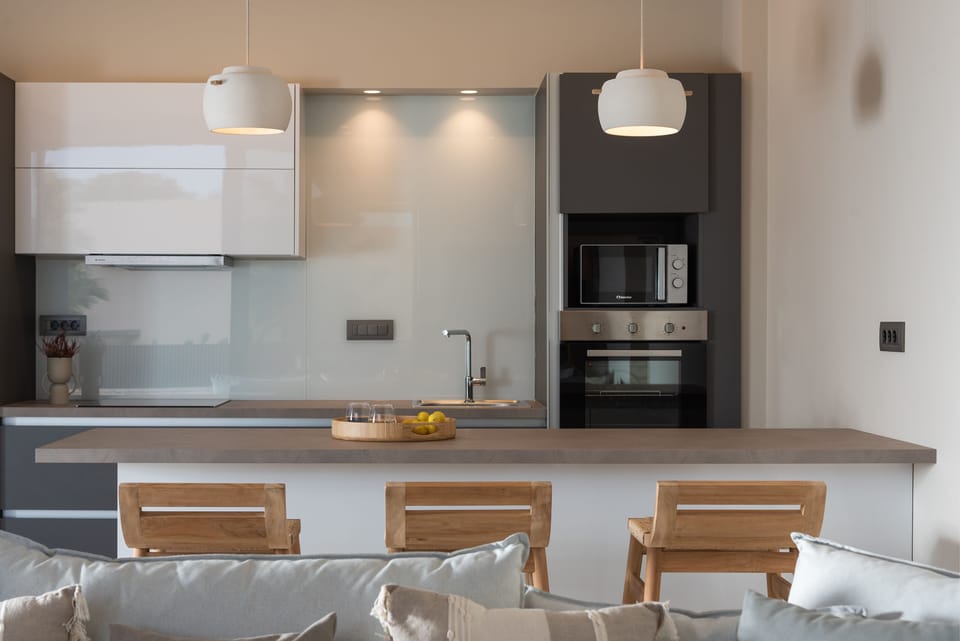 The rough-luxe kitchen is well-equipped for a self-catering stay. 