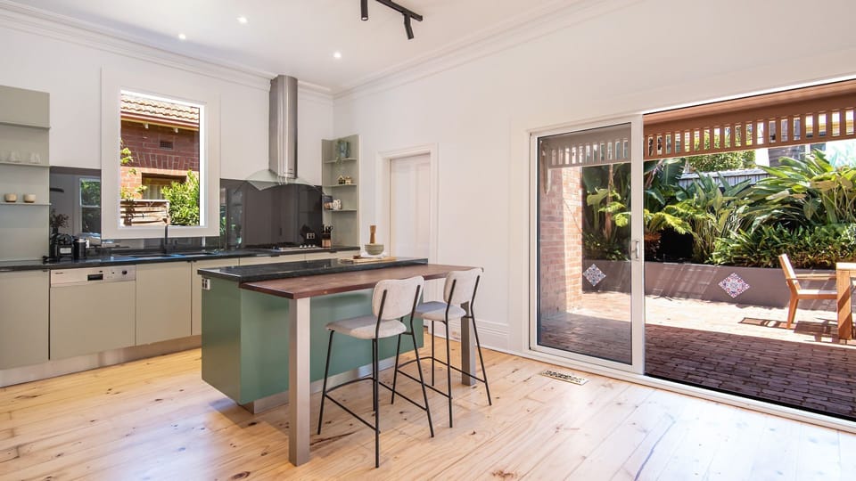 Chefs kitchen with breakfast bar