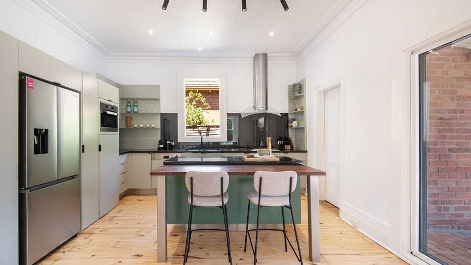 Chefs kitchen with breakfast bar