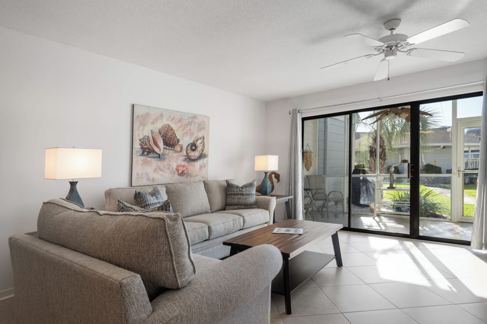Living room inside this Miramar Beach vacation rental townhome