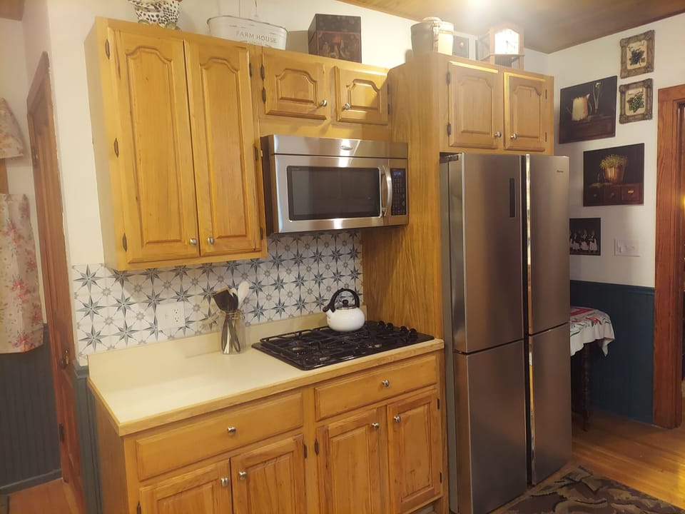 Stainless appliances.  4 door large refrigerator & freezer.  Icemaker included. 