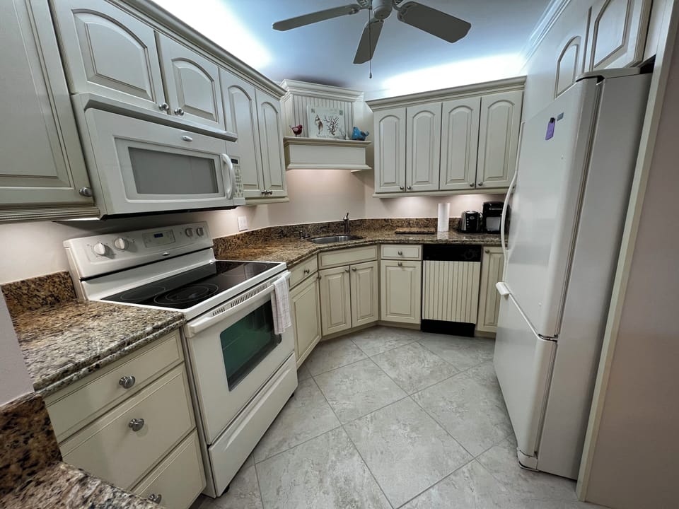 Well appointed kitchen includes dishwasher and all utensils.