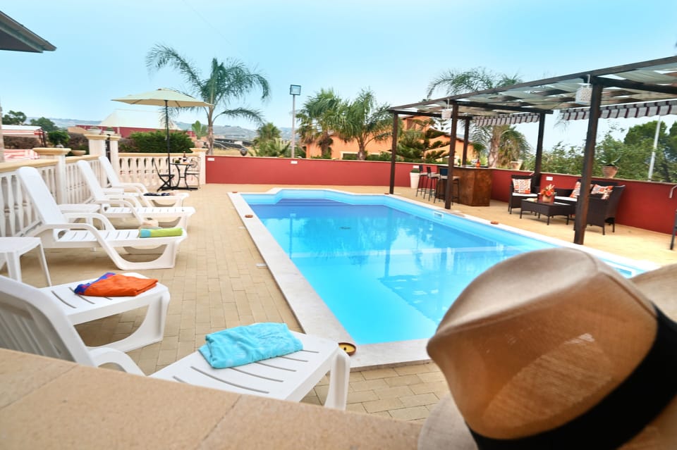 Pool area with bar and fridge/freezer
