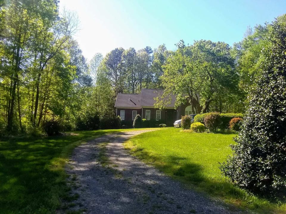the circle driveway leading to our house (the gravel is now paved)
