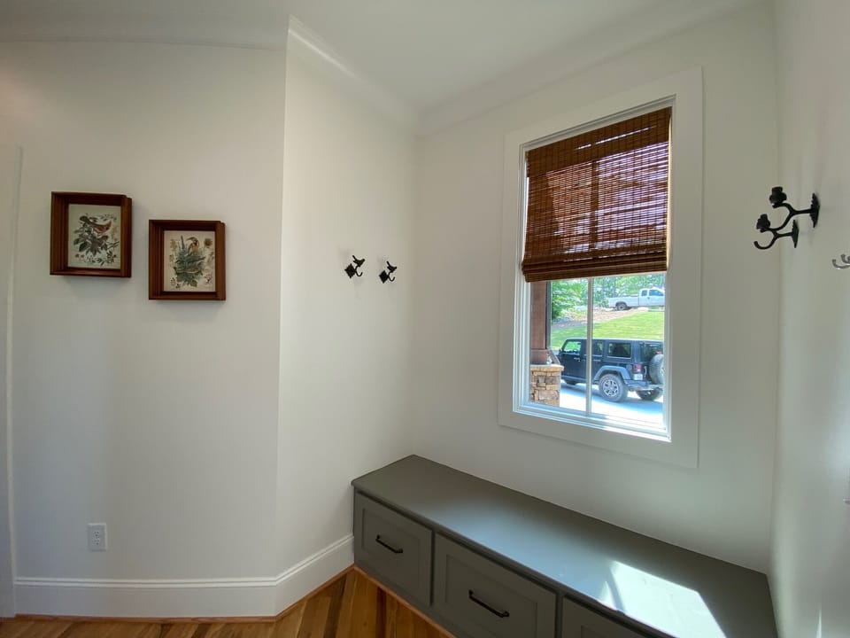 Mud room/drop zone off kitchen and laundry room. 