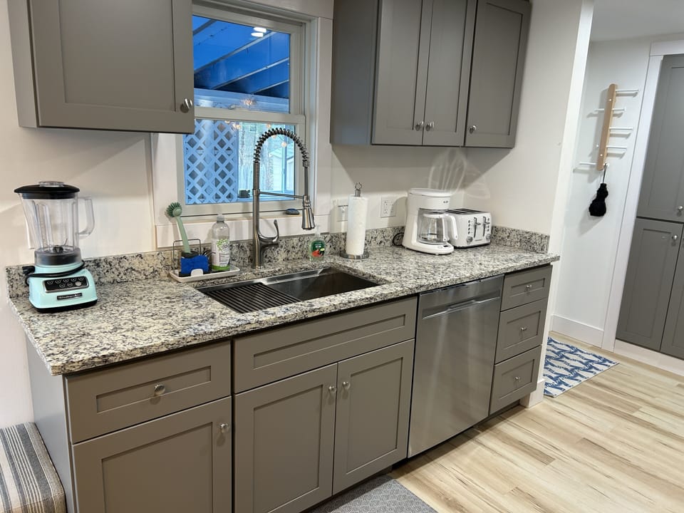 Kitchen sink with a view to the porch