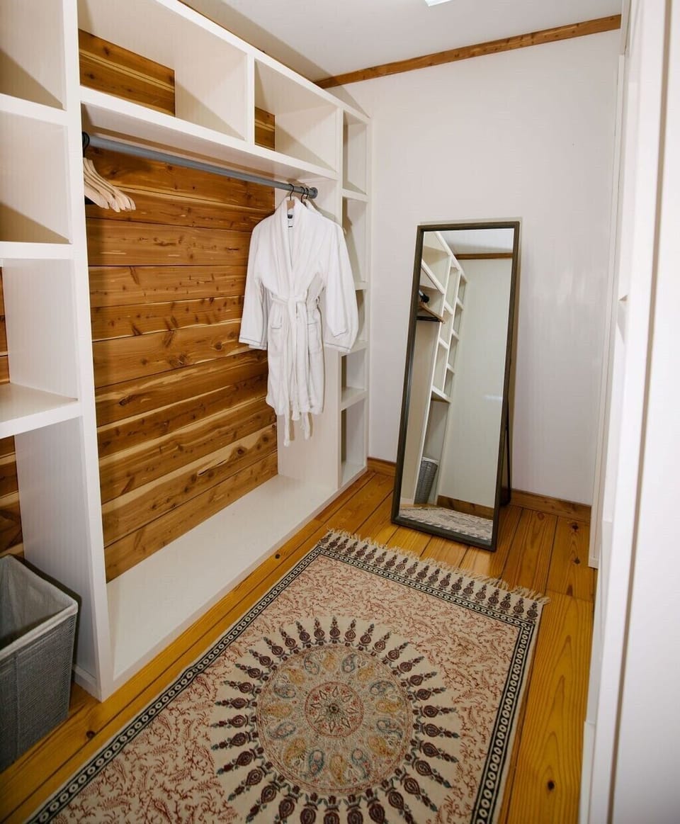 Primary walk-in closet. 