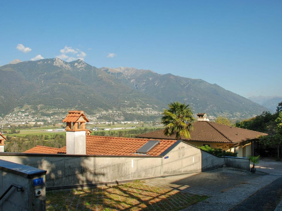 Sky, Mountain, Cloud, Plant, Tree, Land Lot, Highland, Building, Residential Area, Mountainous Landforms