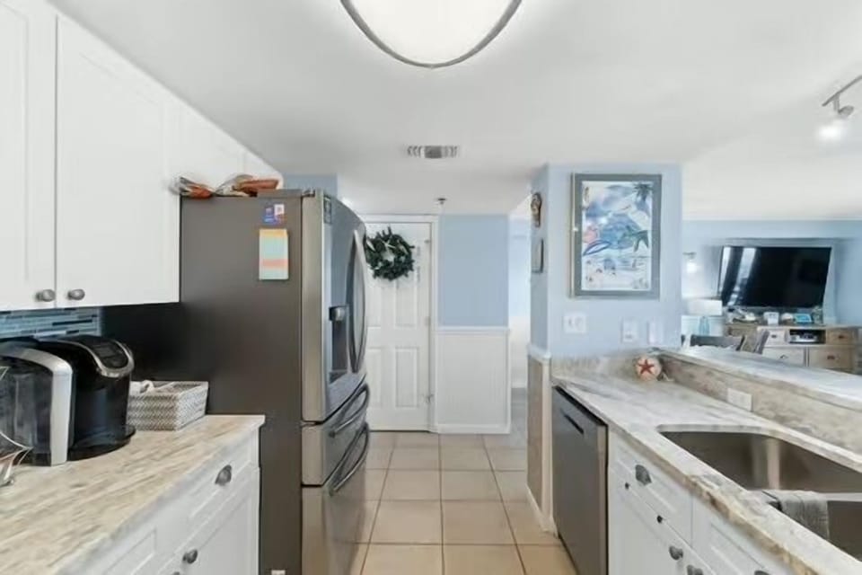 Kitchen with new countertops added in 2025.