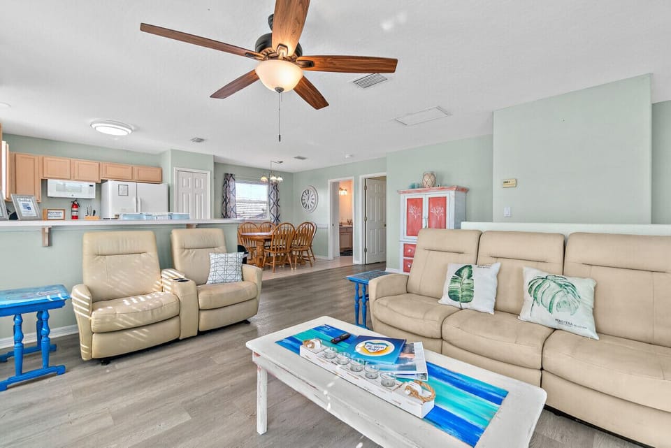 Second floor living area with reclining chairs and Roku TV