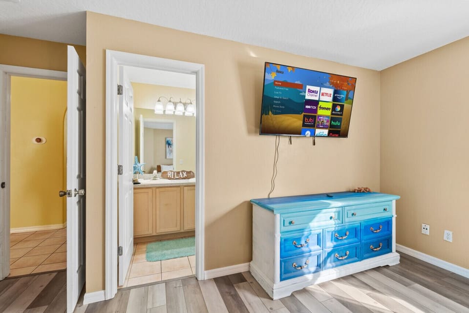 Bedroom with King bed, Roku TV and private bathroom