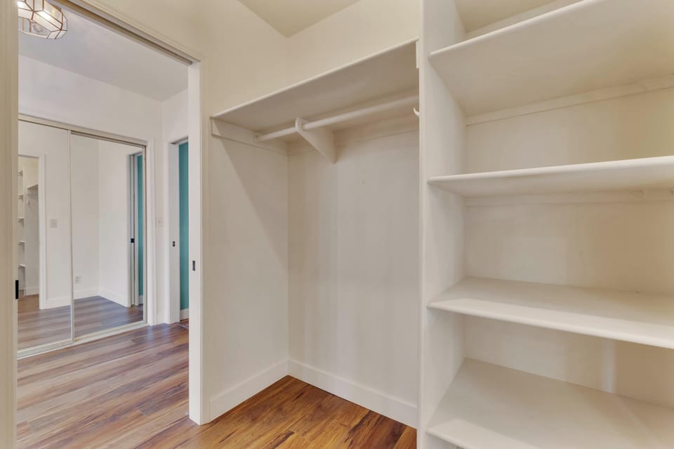 Keep your belongings organized and accessible in Bedroom #1’s generous walk-in closet! 🧳