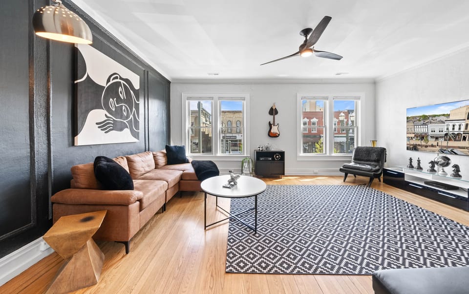 Living room area with Roku smart T.V. (no cable) overlooking Main Street