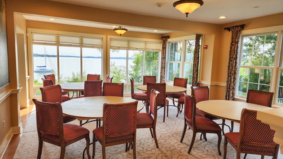 Main House dining room with water view - round tables