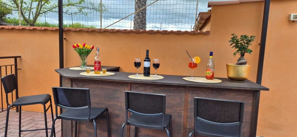 Afternoon cocktails & evening parties, offering both, a dry, covered lounge area