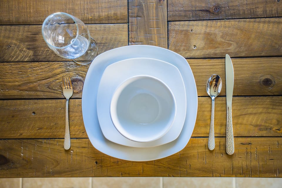 Dine in style: plates, glasses, silverware are there for you.