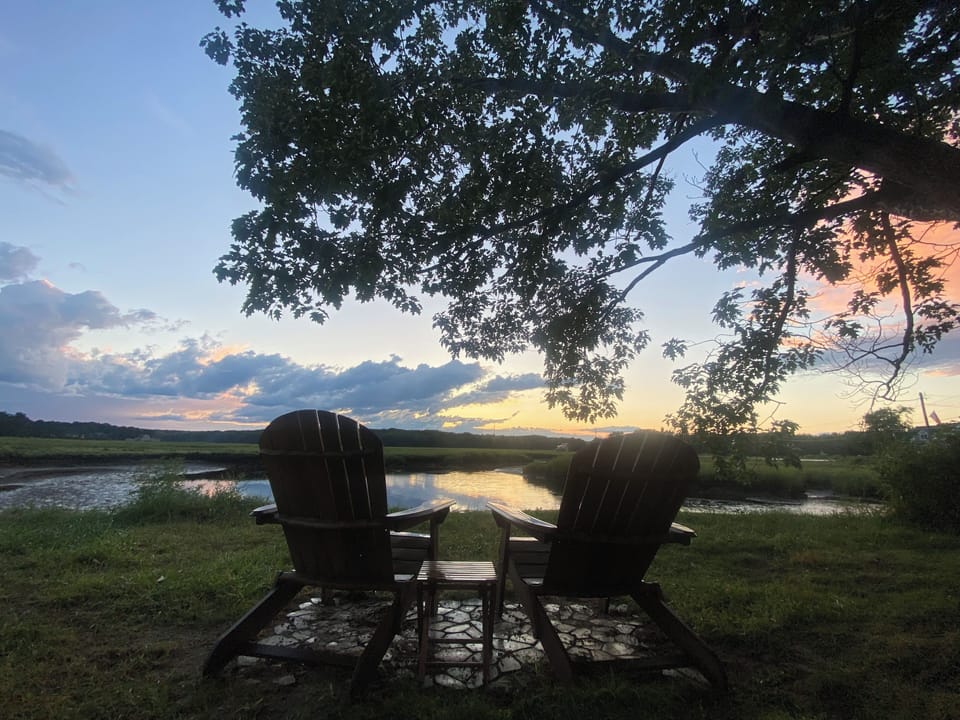 Sunset over the marsh from the adirondack chairs. So relaxing!