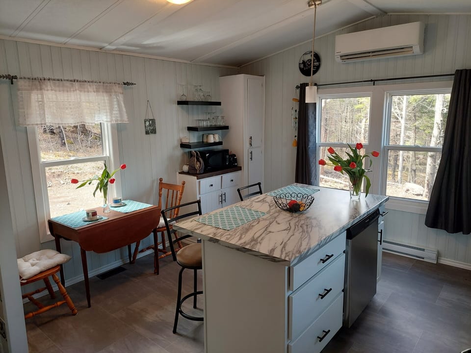 Well-equipped kitchen. Table with drop leaves perfect for 2 or 4, plus island.