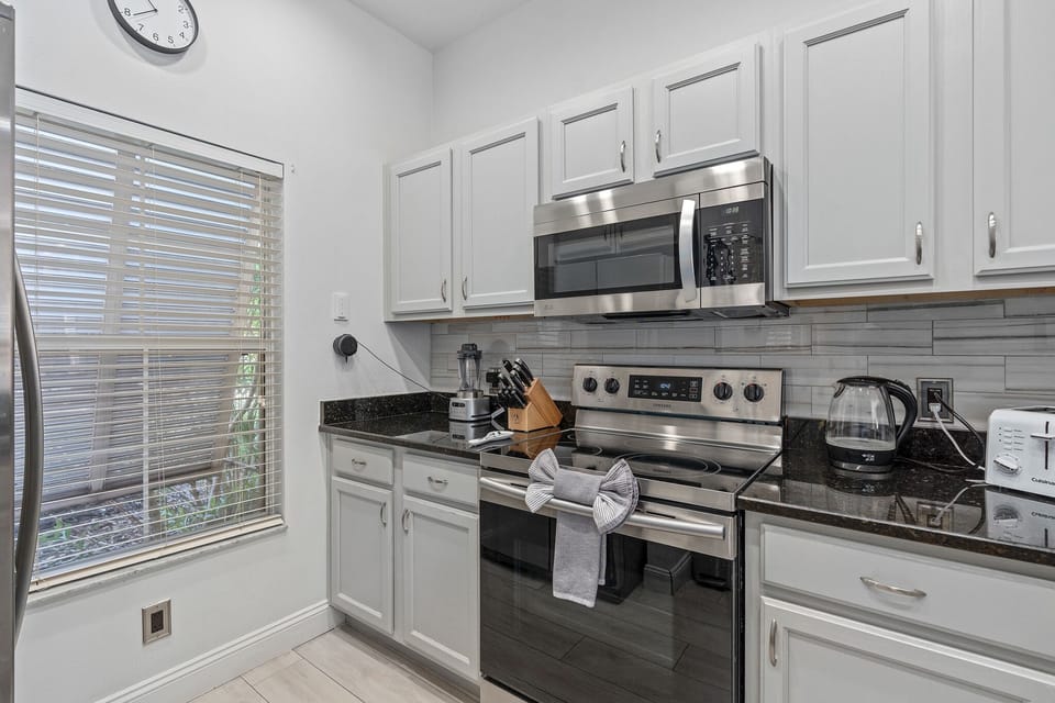 Culinary Adventures Begin Here: Your fully-equipped kitchen awaits.