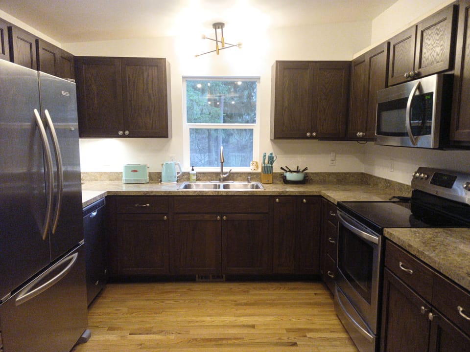 A fully stocked kitchen with all the small appliances you may need.