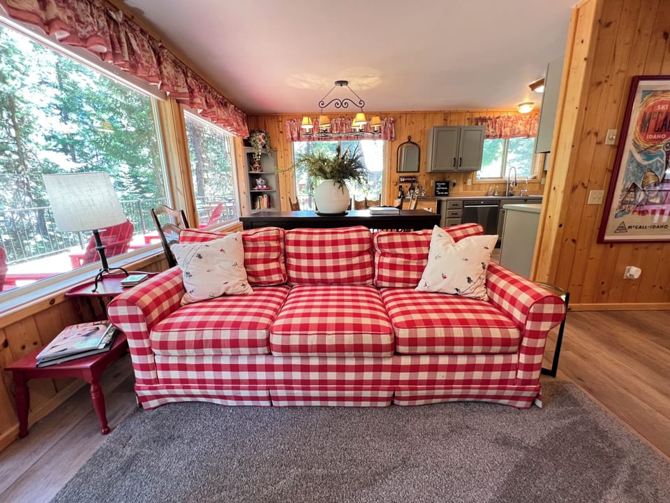 Custom comfy couches for movie nights in. Popcorn maker included!