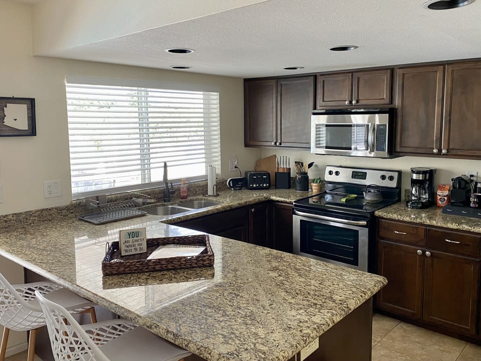 Kitchen:
- Nespresso
- Regular coffee pot 
- Pots & pans