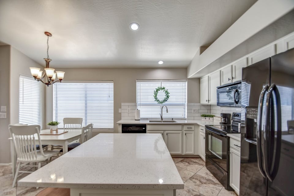 Kitchen equipped to prepare, cook and serve meals.  