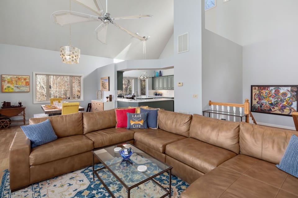 Large sectional and view to dining and kitchen