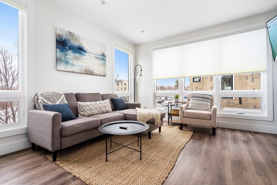 【Brand New】3-story townhome with open-concept living/dining areas, 2 bedrooms, 2 full baths, and a private rooftop terrace