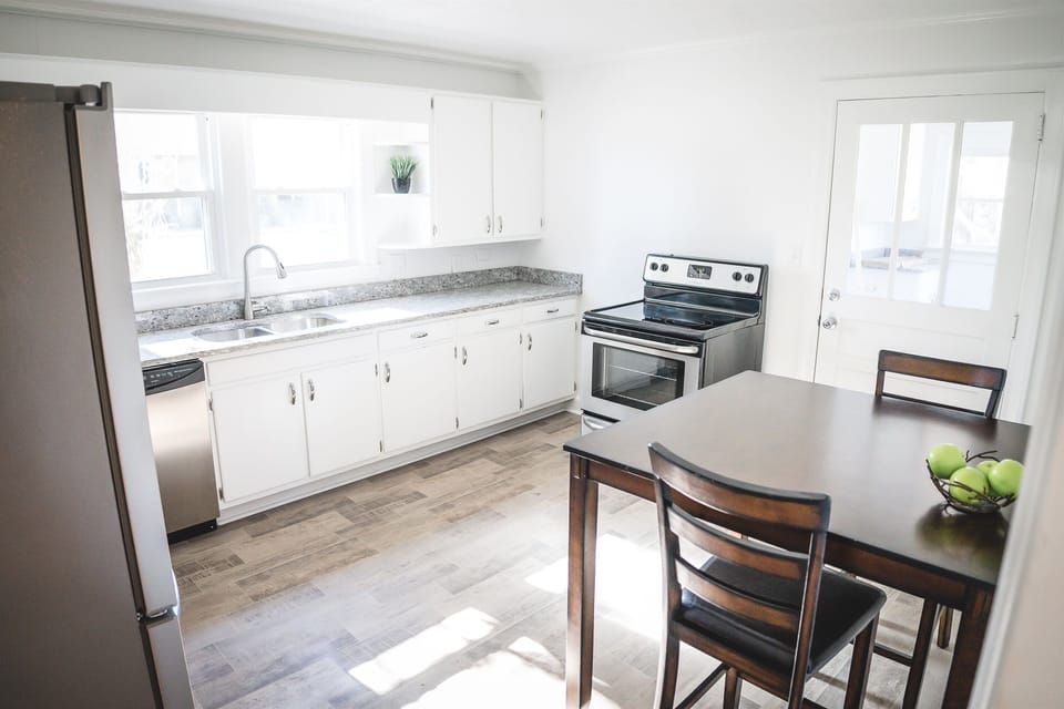 Well-Equipped Kitchen Ready for Crafting Delicious Meals for Your Beloved Guests.