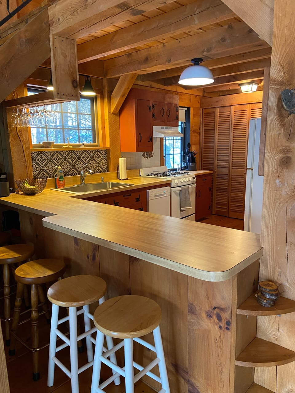 Kitchen with stocked items. Belly up to the bar!