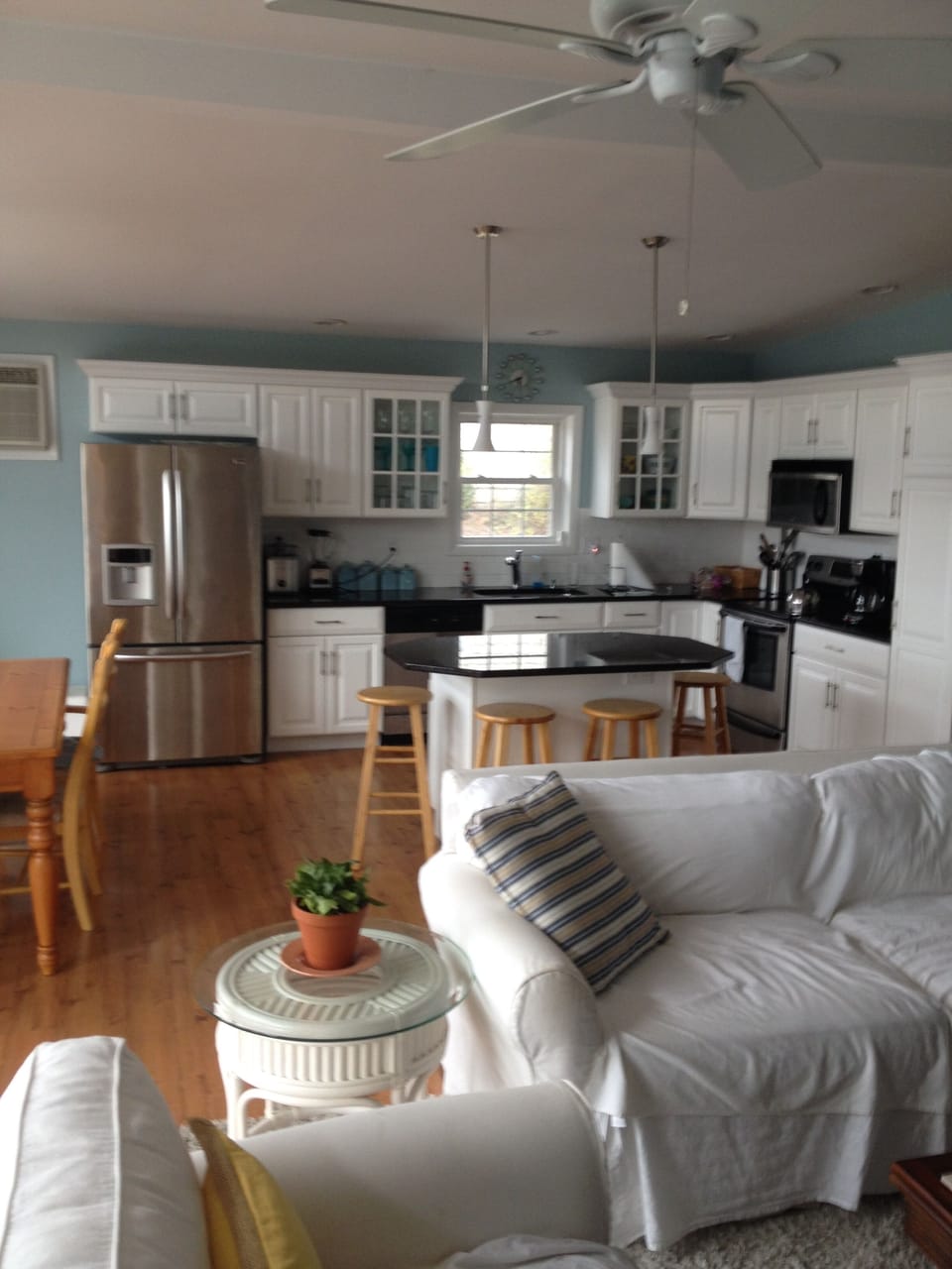 Fully stocked kitchen with granite and stainless steel appliances