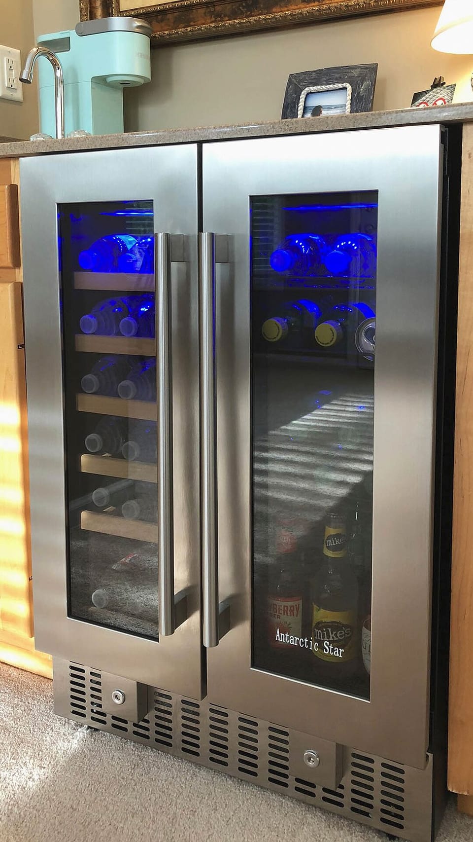 Complimentary bottled water in the rec room beverage refrigerator.