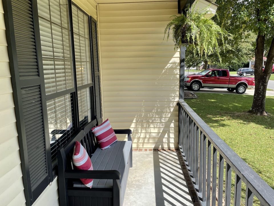 Front porch with bench for sipping your morning coffee! Wonderful place to relax